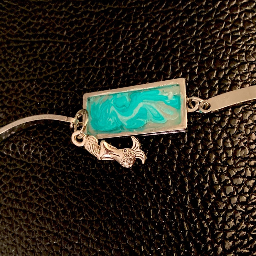 NWT.  Handmade turquoise water color with mermaid charm bracelet